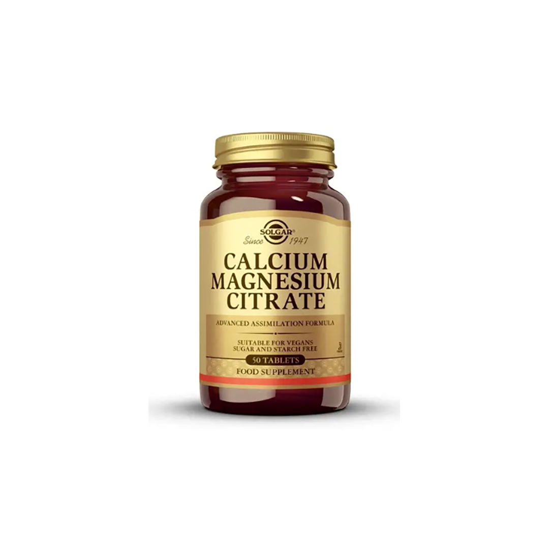 A bottle labeled "Solgar Calcium Magnesium Citrate" containing 50 tablets features dietary supplement information, showcased with a gold and brown design. This blend of essential minerals is designed to promote bone health and overall well-being.