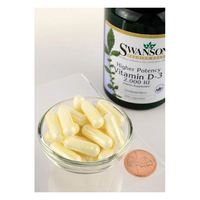 Thumbnail for A bowl of yellow capsules is next to a Swanson Vitamin D3 2000 IU 250 Capsules bottle and a penny for scale, emphasizing the role of Vitamin D3 in supporting bone health.