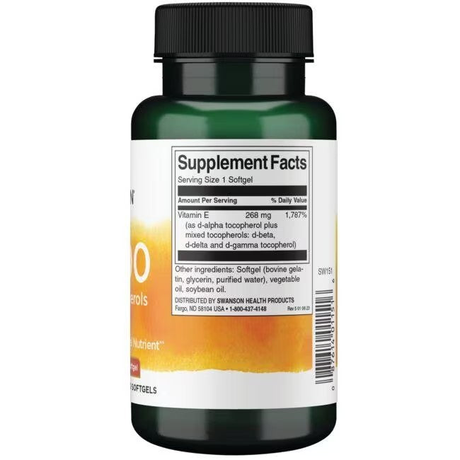 A green bottle of Swanson's Vitamin E-400 Mixed Tocopherols 100 Softgels displays its label with supplement facts and ingredients, featuring antioxidant tocopherols.