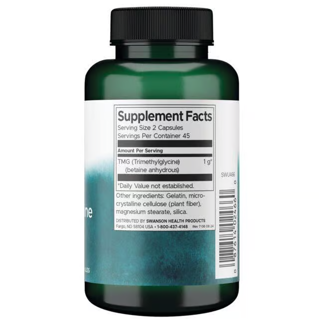 The Swanson TMG Trimethylglycine 500 mg 90 Capsules is housed in a green bottle with a supplement facts label that lists its serving size and ingredients, including gelatin and magnesium stearate, formulated to support liver health.