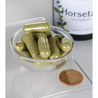 Miniatura de Swanson's Horsetail - 500 mg 90 capsules numa tigela ao lado de um frasco de Swanson's horsetail.