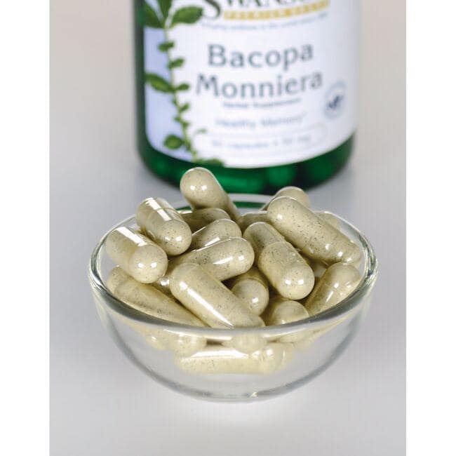 SwansonBacopa Monnieri, suplemento alimentar - 50 mg 90 cápsulas numa taça ao lado de um frasco.