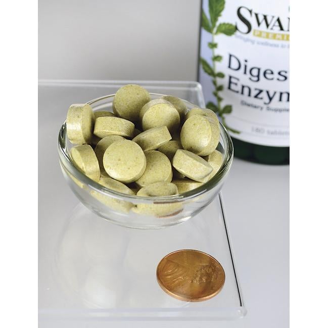 Um frasco de Swanson Digestive Enzymes - 180 tabs e uma moeda de um cêntimo numa taça de vidro.