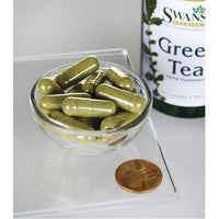 Miniatura de Um frasco de Swanson Green Tea - 500 mg 100 capsules com um cêntimo ao lado.