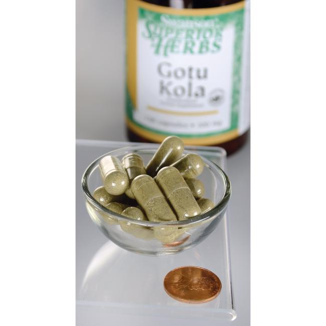 Um frasco de Swanson Gotu Kola Extract - 100 mg 120 capsules está ao lado de uma tigela.