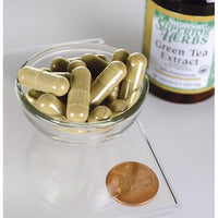 Miniatura de Swanson's Green Tea Extract - 500 mg 60 capsules ao lado de uma moeda.