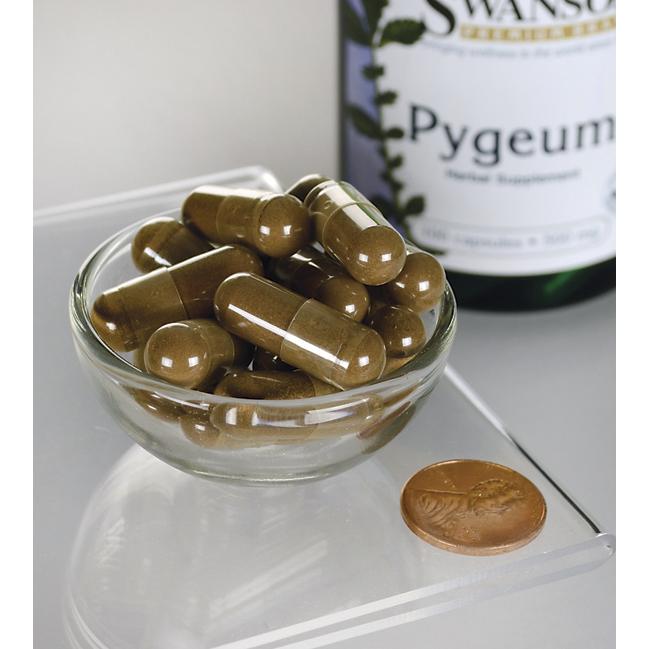 Swanson Pygeum - 500 mg 100 cápsulas numa tigela ao lado de uma garrafa de Swanson Pygeum para a saúde da próstata.