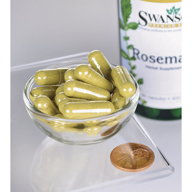 Uma taça com um frasco de Swanson Rosemary - 400 mg 90 capsules, uma erva rica em antioxidantes, e uma moeda.